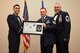 U.S. Air Force Tech. Sgt. Jeremy Vonada, 316th Training Squadron, receives their certificate of selection from Col. Ricky Mills, 17th Training Wing commander, and Chief Master Sgt. Daniel Stein, 17th Training Group superintendent, during the Senior NCO Induction Ceremony at the Event Center on Goodfellow Air Force Base, Texas, Aug. 18, 2017. (U.S. Air Force photo by Airman 1st Class Chase Sousa/Released)