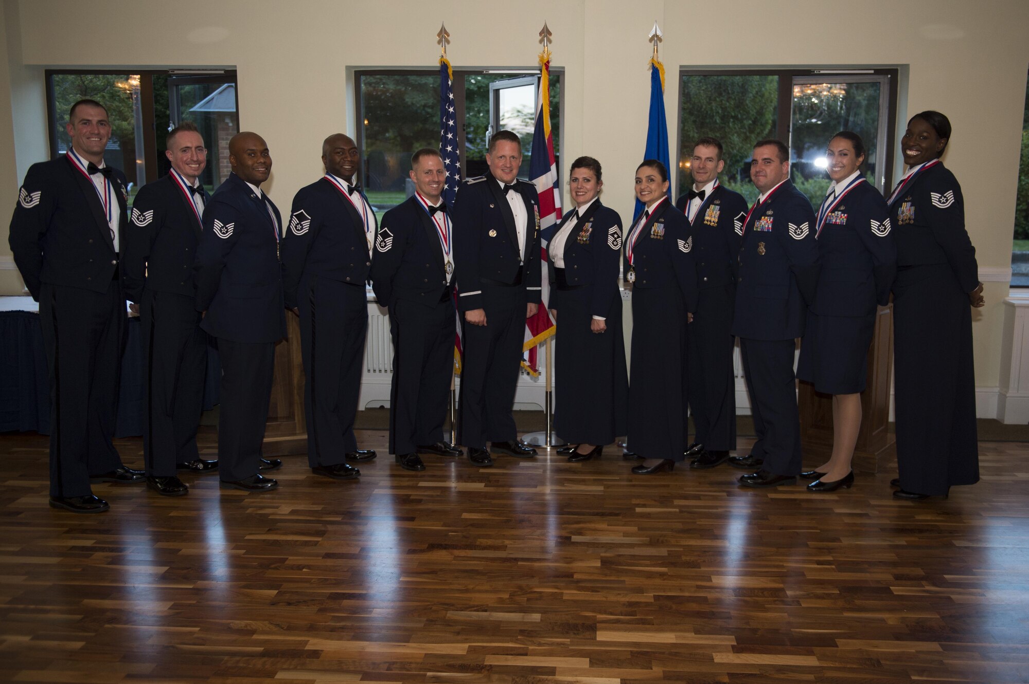 SNCO inductees take a group photo with Col. Kale, 501st CSW Commander, and
CMSgt Gawan, 501st CSW Command Chief, after officially being inducted as
SNCOs, 18 August 2017, RAF Alconbury, United Kingdom. (U.S. Air Force photo
by Airman 1st Class Zachary Bumpus)
