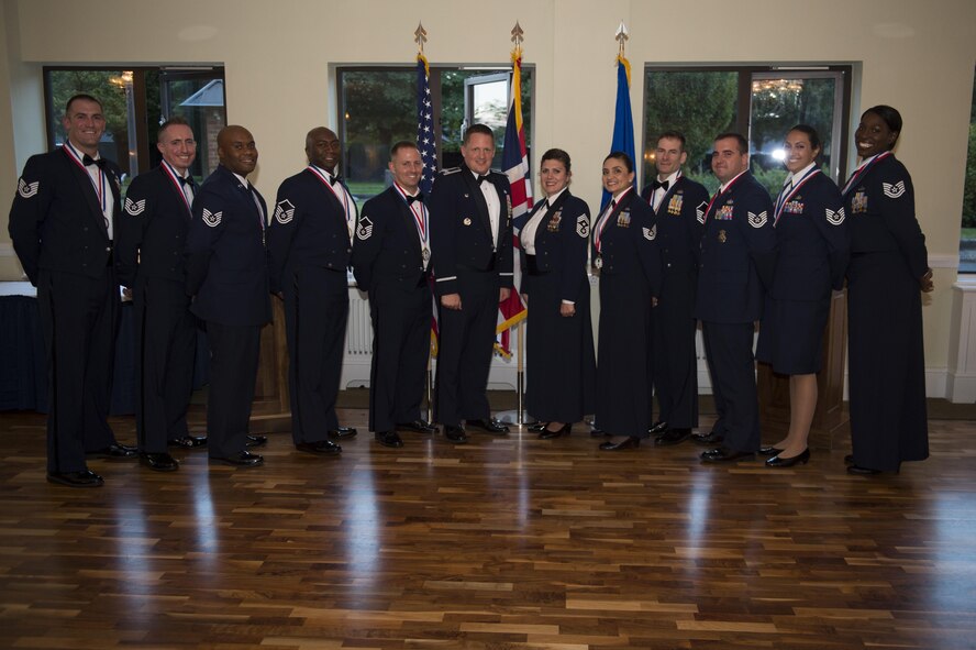 SNCO inductees take a group photo with Col. Kale, 501st CSW Commander, and
CMSgt Gawan, 501st CSW Command Chief, after officially being inducted as
SNCOs, 18 August 2017, RAF Alconbury, United Kingdom. (U.S. Air Force photo
by Airman 1st Class Zachary Bumpus)