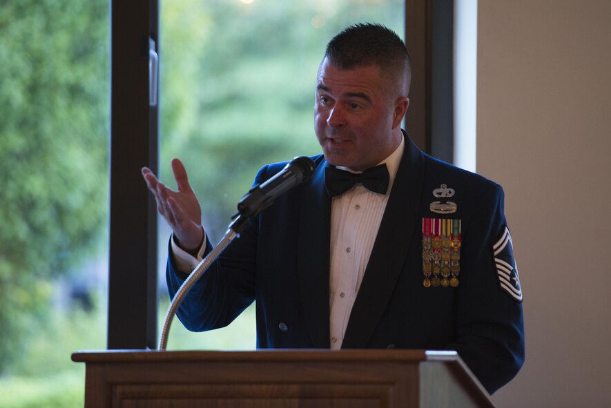 Senior Master Sgt. Travis Laws, the Superintendent for Operational
Compliance of the 100th Logistics Readiness Squadron, speaks as a guest at
the 501st SNCO Induction ceremony, 18 August 2017, RAF Alconbury, United
Kingdom. Laws spoke about his experiences in Iraq and imparted valuable
wisdom to the new SNCOs. (U.S. Air Force photo by Airman 1st Class Zachary
Bumpus)