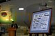 U.S. Air Force Lt. Col. Matthew Cottrill, 95th Reconnaissance Squadron commander, speaks about a painting commissioned for the squadron’s 100th birthday Aug. 19, 2017, on RAF Mildenhall, England. The painting contains notable aircraft flown by the 95th over the years. (U.S. Air Force photo by Airman 1st Class Luke Milano)