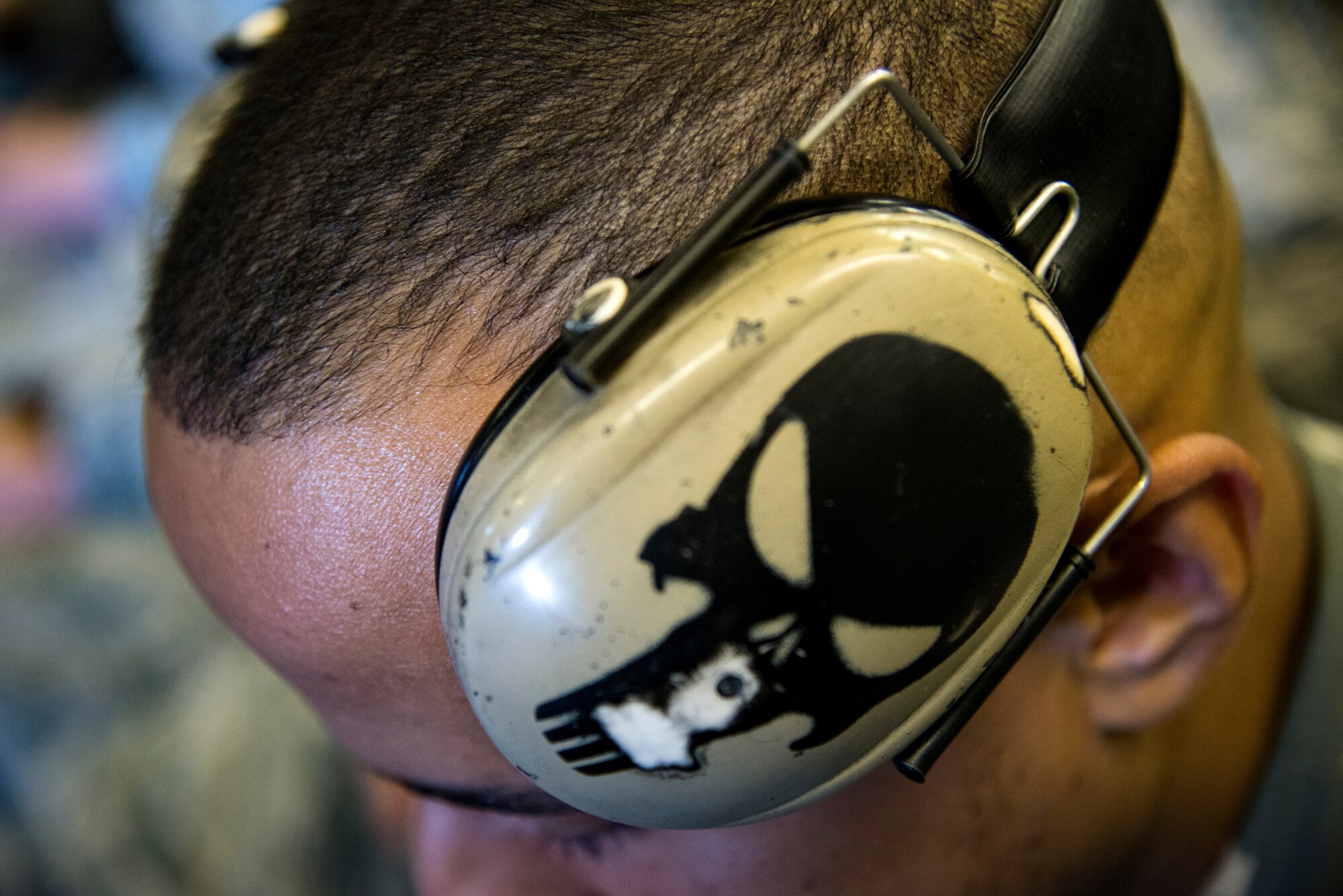 Staff Sgt. Marcos Collazo, 23d Maintenance Group aircraft structural maintainer awaits takeoff aboard a KC-10 Extender, Aug. 19, 2017, at Moody Air Force Base, Ga. The Airmen were travelling to Nellis Air Force Base, Nev., to support the Weapons Instructor Course, which trains tactical experts and leaders to control and exploit air, space and cyberspace. (U.S. Air Force photo by Airman 1st Class Erick Requadt)