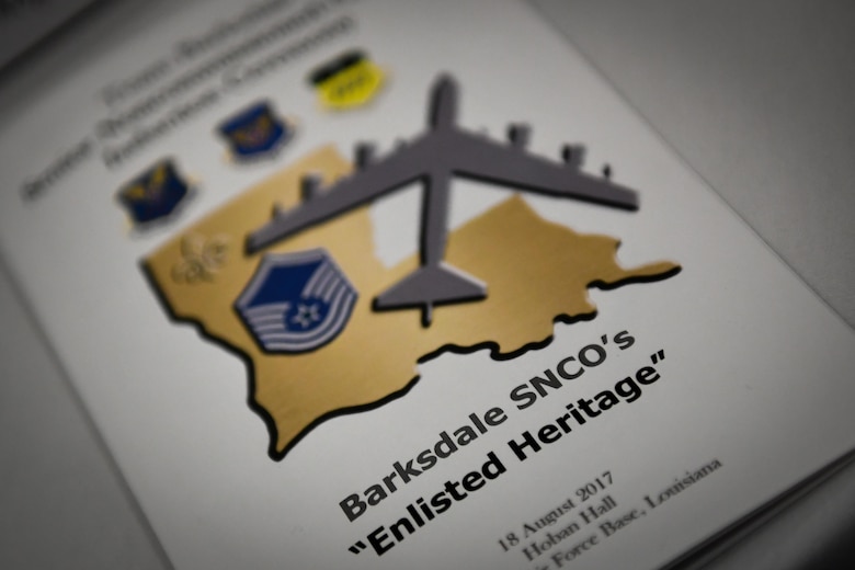 A program of events is displayed on a table during the 2017 Senior NCO induction ceremony at Barksdale Air Force Base, La., Aug. 18. The event consisted of a social hour, formal introduction of inductees and their guests and a guest speaker.