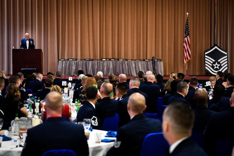 Chief Master Sgt. William Cisna, 2nd Medical Group superintendent, speaks to attendees during the 2017 Senior NCO induction ceremony at Barksdale Air Force Base, La., Aug. 18. Cisna spoke about the heritage and tradition of the master sergeant rank while also providing inductees with advice on how to excel as senior noncommissioned officers.