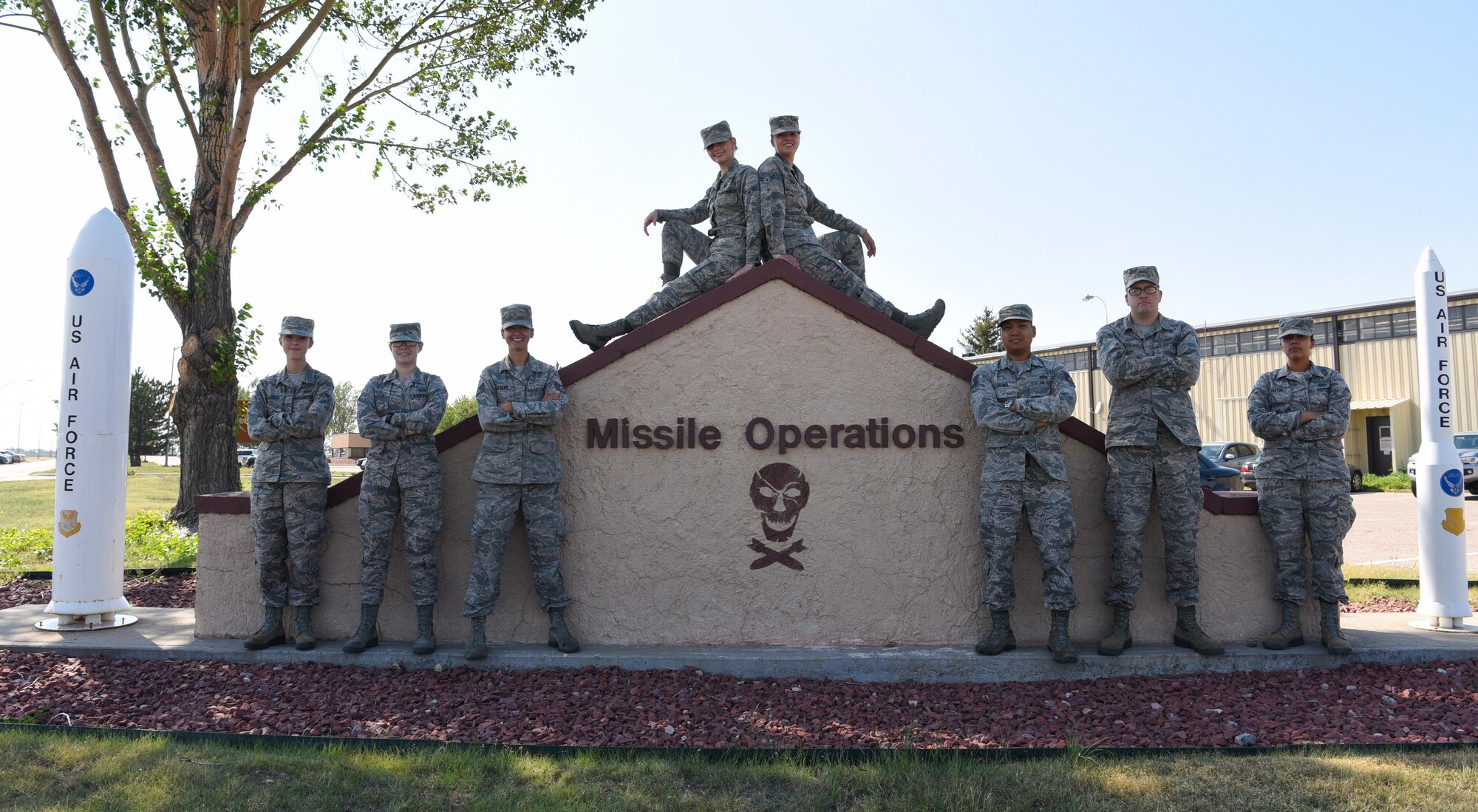 Airmen pose for a photo