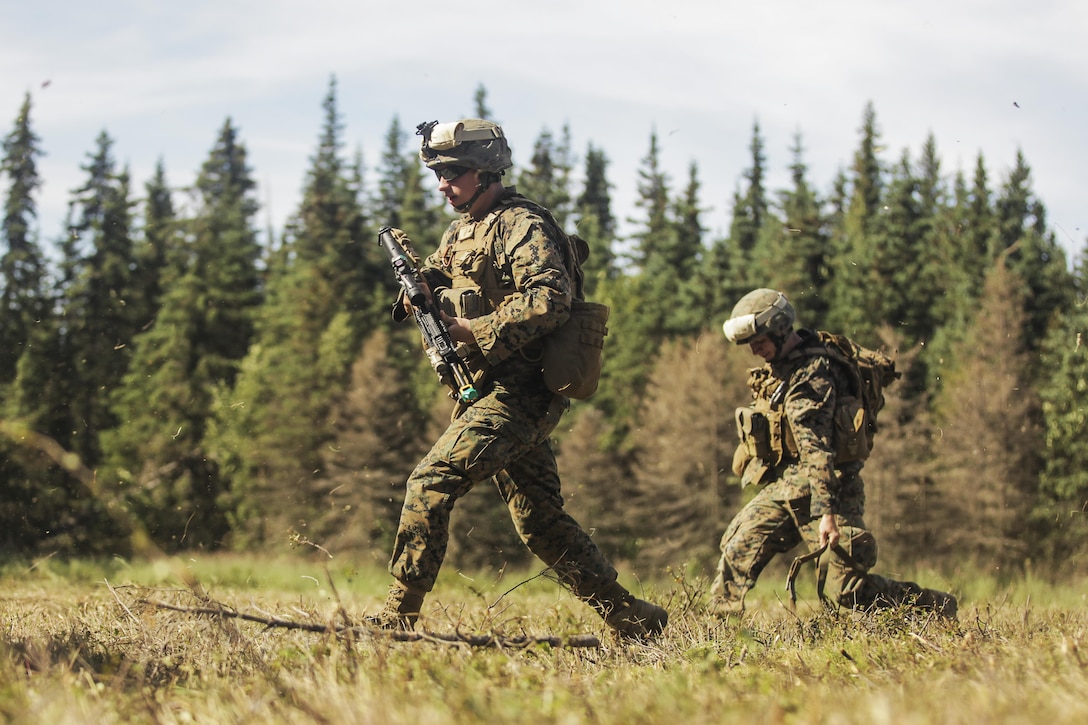 U.S. Marines with 3rd Battalion, 25th Marine Regiment, 4th Marine Division, Marine Forces Reserve, prepare to move out after being inserted by U.S. Army UH-60 Blackhawks to Landing Zone 15, Joint Base Elmendorf-Richardson, Alaska, Aug. 5, 2017.