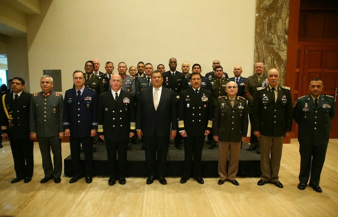 Military leaders representing 9 South American nations and the United States pose for a group photo during the South American Defense Conference in Lima, Peru