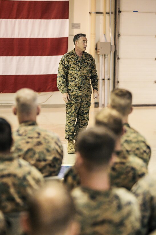 U.S. Marine Corps Chief Warrant Officer 3, Gunner Daniel R. Langlois, Division Super Squad Officer in Charge, speaks to the Marines and Sailors during the Super Squad Award Ceremony on Joint Base Elmendorf-Richardson, Alaska, Aug. 9, 2017.
