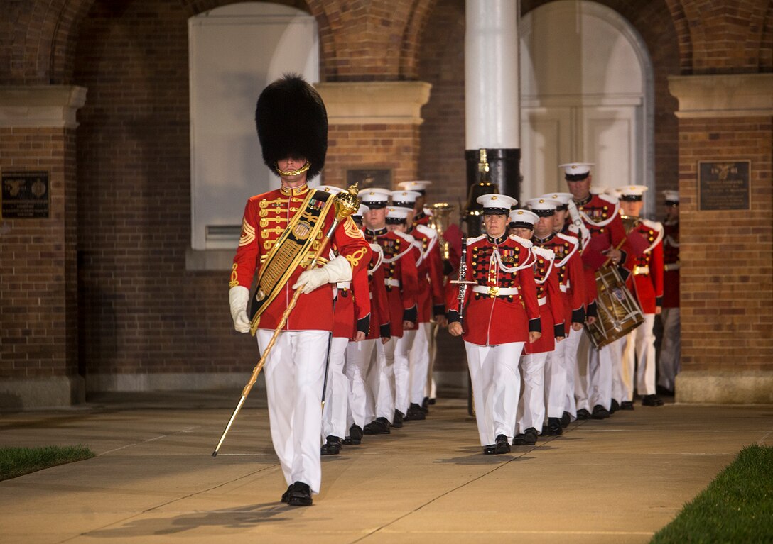 Master Sgt. Duane F. King, drum major, “The President’s Own” U.S. Marine Band marches the band onto the parade deck during a Friday Evening Parade at Marine Barracks Washington D.C., Aug. 18, 2017. The guest of honor for the parade was the Superintendent of the U.S. Naval Academy, Vice Adm. Walter E. Carter, Jr., and the hosting official was the Deputy Commandant, Combat Development and Integration Commanding General, Marine Corps Combat Development Command, Lt. Gen. Robert S. Walsh. (Official Marine Corps photo by Lance Cpl. Damon McLean/Released)