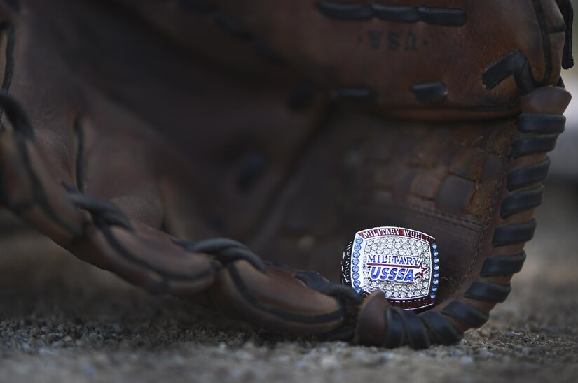 A U.S. Special Sports Association Military World Series ring rests in a glove on Joint Base Andrews, Md., Aug. 23, 2017. Approximately 20 women from the National Capital Region who make up the Lady Not Forgotten softball team brought back the winning title from the tournament held every year in August in Augusta, Ga., Aug. 14.