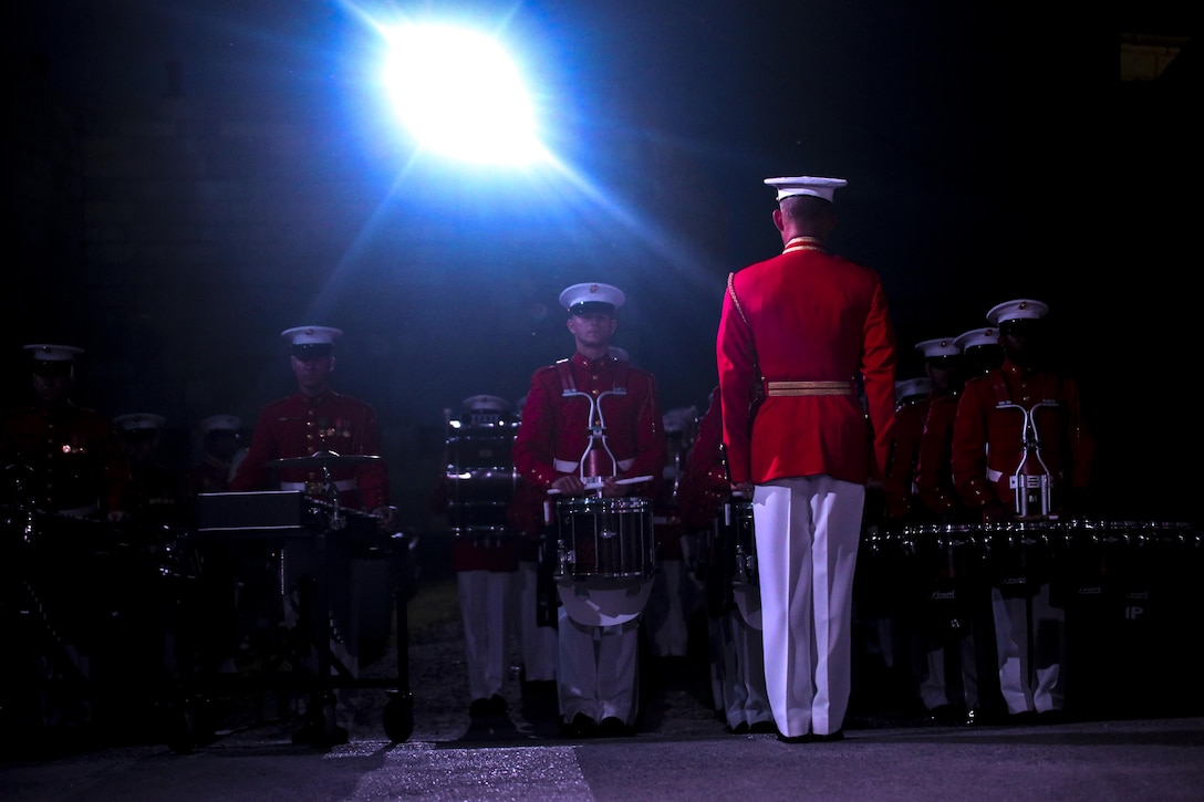 Marines with “The Commandant’s Own” U.S. Marine Drum & Bugle Corps prepare to perform alongside the Fort Henry Guard at Kingston, Ontario, Canada, Aug. 19, 2017. This visit marked the anniversary of the Ogdensburg Agreement, which was signed by President Roosevelt and Prime Minister King to bind the two nations in the combined defense of North America. Since then, the two units have paraded together countless times both at the Fort and at Marine Barracks Washington. (Official U.S. Marine Corps photo by Lance Cpl. Damon McLean/Released)