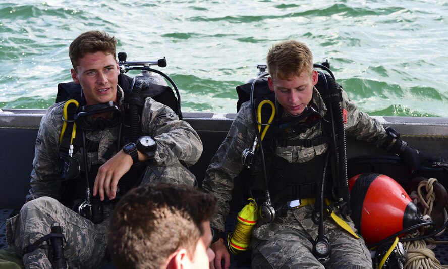 U.S. Air Force diving students await to begin their training in the Gulf of Mexico, Aug. 15, 2017. Both pararescue and combat controller Airmen get their dive training at the Naval Diving and Salvage Training Center.