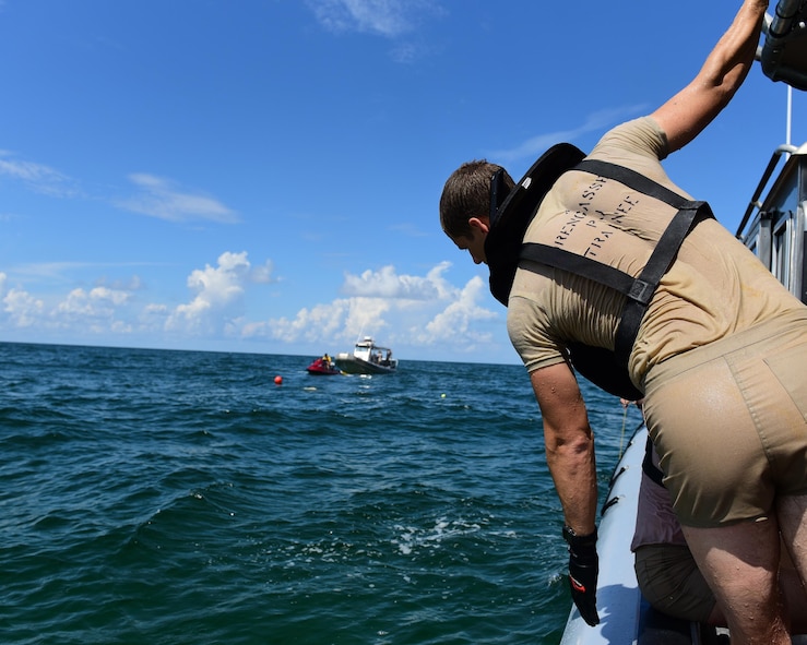 A U.S. Air Force diving student observes the rest of his team during a training exercise in the Gulf of Mexico, Aug. 15, 2017. The vision of the dive school is to develop the 'whole' diver, mind, body and heart, with the skills and confidence to successfully complete missions and integrate with all combat forces to offset our adversaries in the undersea domain.