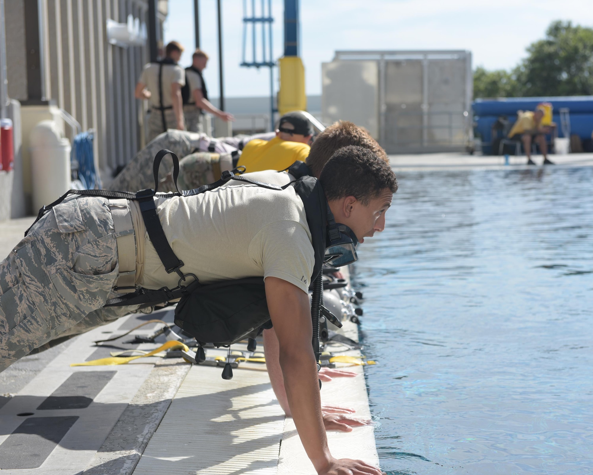U.S. Air Force diving students prepare for the morning’s dive training by doing a set of pushups at Naval Support Activity Panama City, Fla., Aug. 2, 2017. Both pararescue and combat controller Airmen get their dive training at the Naval Diving and Salvage Training Center.
