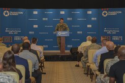 Col. Jeffrey Nelson, 628th Air Base Wing commander, gave opening remarks to attendees of the Hiring Our Heroes transition summit at the Charleston Club in Joint Base Charleston, S.C., Aug. 22.