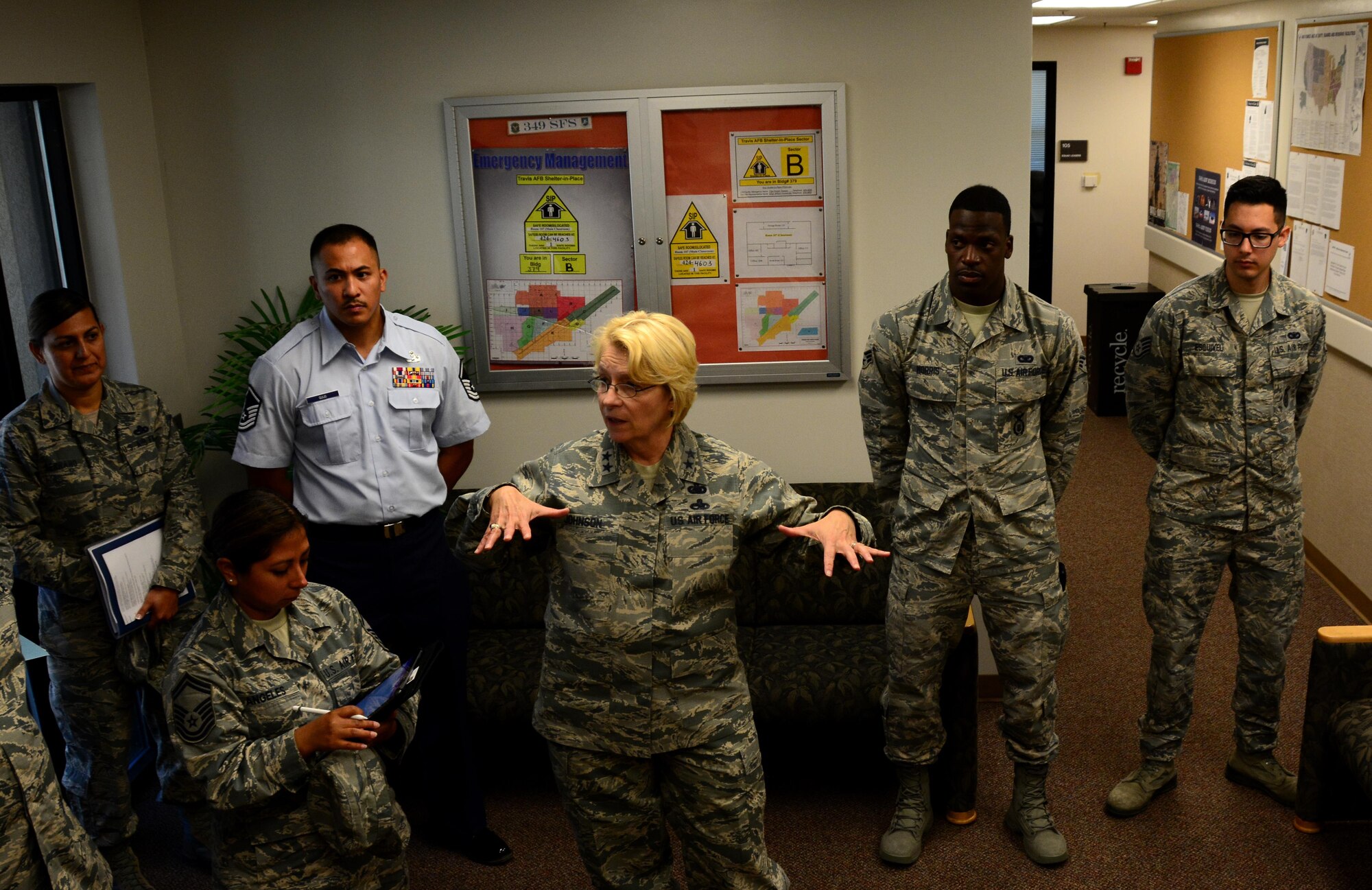 Maj. Gen. Kathryn Johnson, director of logistics, Air Force Reserve Command, speaks with 349th Security Forces Squadron members, at Travis Air Force Base, Calif., on Aug. 13, 2017.