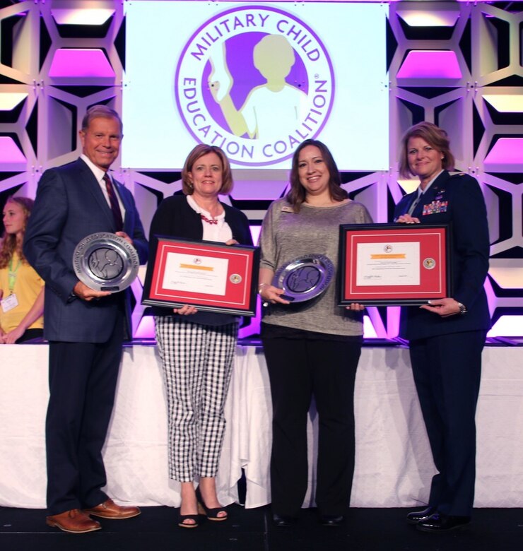 Holloman FSS accepts two awards for excellence