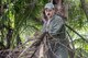 U.S. Air Force 1st Lt. Manuel Lamson, 9th Expeditionary Bomb Squadron weapon systems officer, gathers dried palm frond during a jungle survival course July 27, 2017, at Andersen Air Force Base, Guam. During the course, Airmen were trained on how to build fires, identify edible plants and animals, erect shelters and how to contact friendly forces while isolated. (U.S. Air Force photo by Airman 1st Class Christopher Quail)