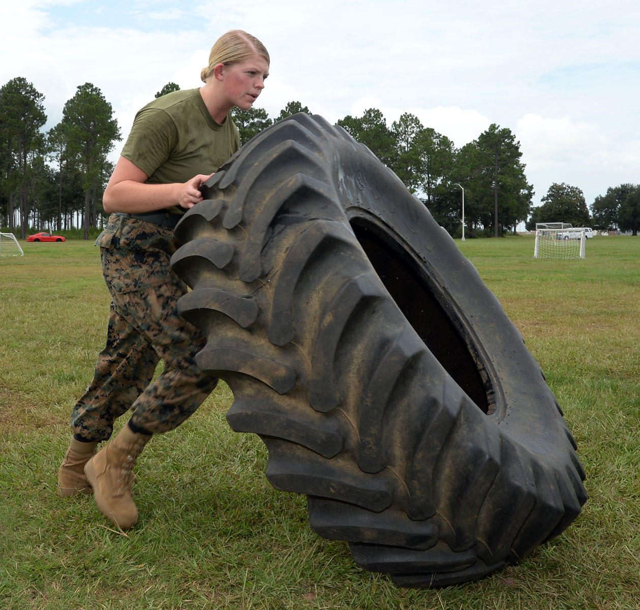 1st Lt. Delaney T. Bourlakov, base adjutant, Marine Corps Logistics Base Albany, flips a 100-pound tire during a recent workout session in preparation for the Third Annual High Intensity Tactical Training Tactical Athlete Championship Competition in Camp Pendleton, Calif., Aug. 27 – Sept. 1.