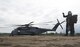 A U.S. Marine Corps pilot and crew chief, both with Heavy Marine Helicopter Squadron 462, talk as they transport personnel and supplies, near Chitose Air Base, Japan, Aug. 16, 2017. Misawa AB has the ability to support and receive multiple units in order to quickly respond to contingency operations. The HMH- 462, Marine Aircraft Group 36, 3rd Marine Aircraft Wing, is forward deployed under the unit deployment program with 1st MAW, based in Okinawa, Japan, for training purposes. The transport took place during Northern Viper 17, an exercise designed to enhance the collective defense capability of the U.S. and Japan security. (U.S. Air Force photo by Airman 1st Class Sadie Colbert)