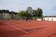 Col. Steven Zubowicz, 52nd Mission Support Group commander (left) and Lt. Col. Ryan Crowley, 52nd Civil Engineer Squadron commander, test out the newly refurbished tennis courts near the base housing office, Aug. 15, 2017. The refurbished tennis courts were a quality-of-life improvement project and will be utilized by the new Spangdahlem High School and base community members. (U.S. Air Force photo by Tech. Sgt. Staci Miller)