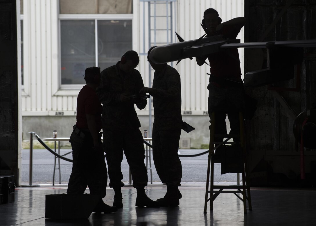 U.S. Air Force weapons standardization Airmen with the 35th Maintenance Group compete for bragging rights during the 3rd quarter loading competition.