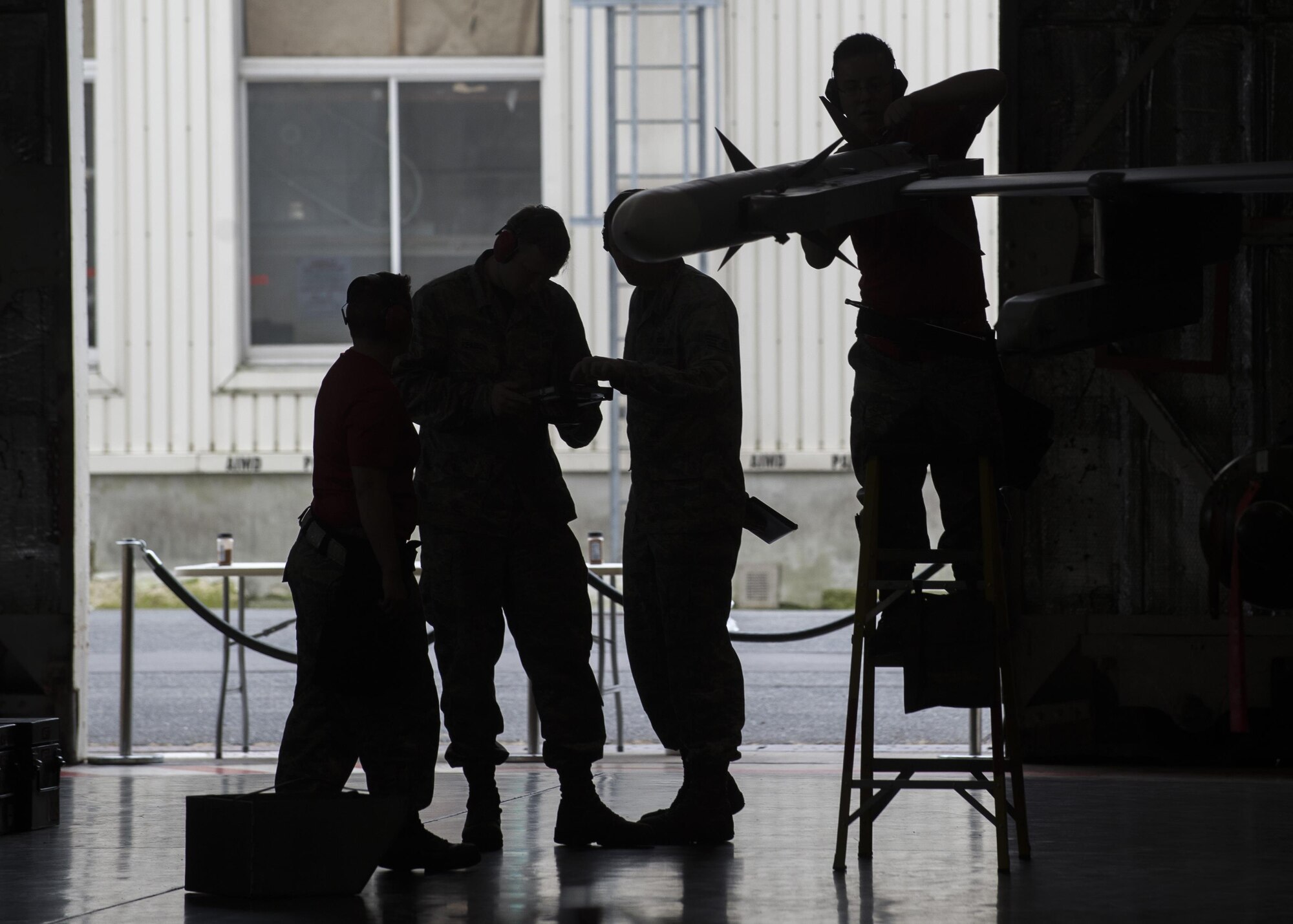U.S. Air Force weapons standardization Airmen with the 35th Maintenance Group compete for bragging rights during the 3rd quarter loading competition.