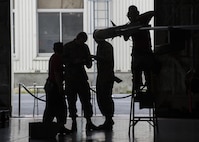 U.S. Air Force weapons standardization Airmen with the 35th Maintenance Group compete for bragging rights during the 3rd quarter loading competition.