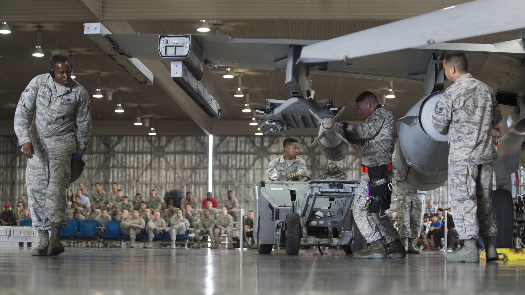 U.S. Air Force weapons standardization Airmen with the 35th Maintenance Group compete for bragging rights during the 3rd quarter loading competition.