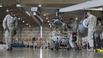 U.S. Air Force weapons standardization Airmen with the 35th Maintenance Group compete for bragging rights during the 3rd quarter loading competition.