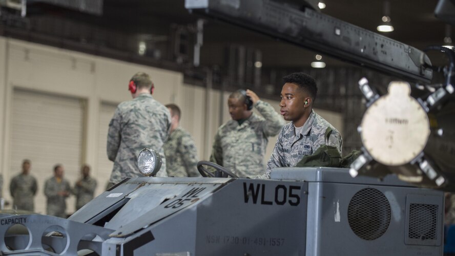 U.S. Air Force weapons standardization Airmen with the 35th Maintenance Group compete for bragging rights during the 3rd quarter loading competition.