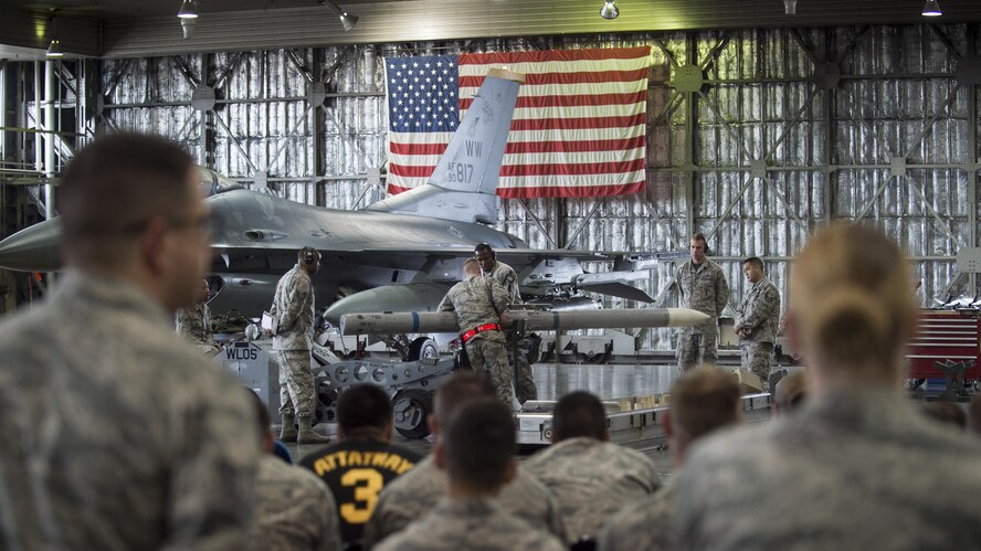 U.S. Air Force weapons standardization Airmen with the 35th Maintenance Group compete for bragging rights during the 3rd quarter loading competition.