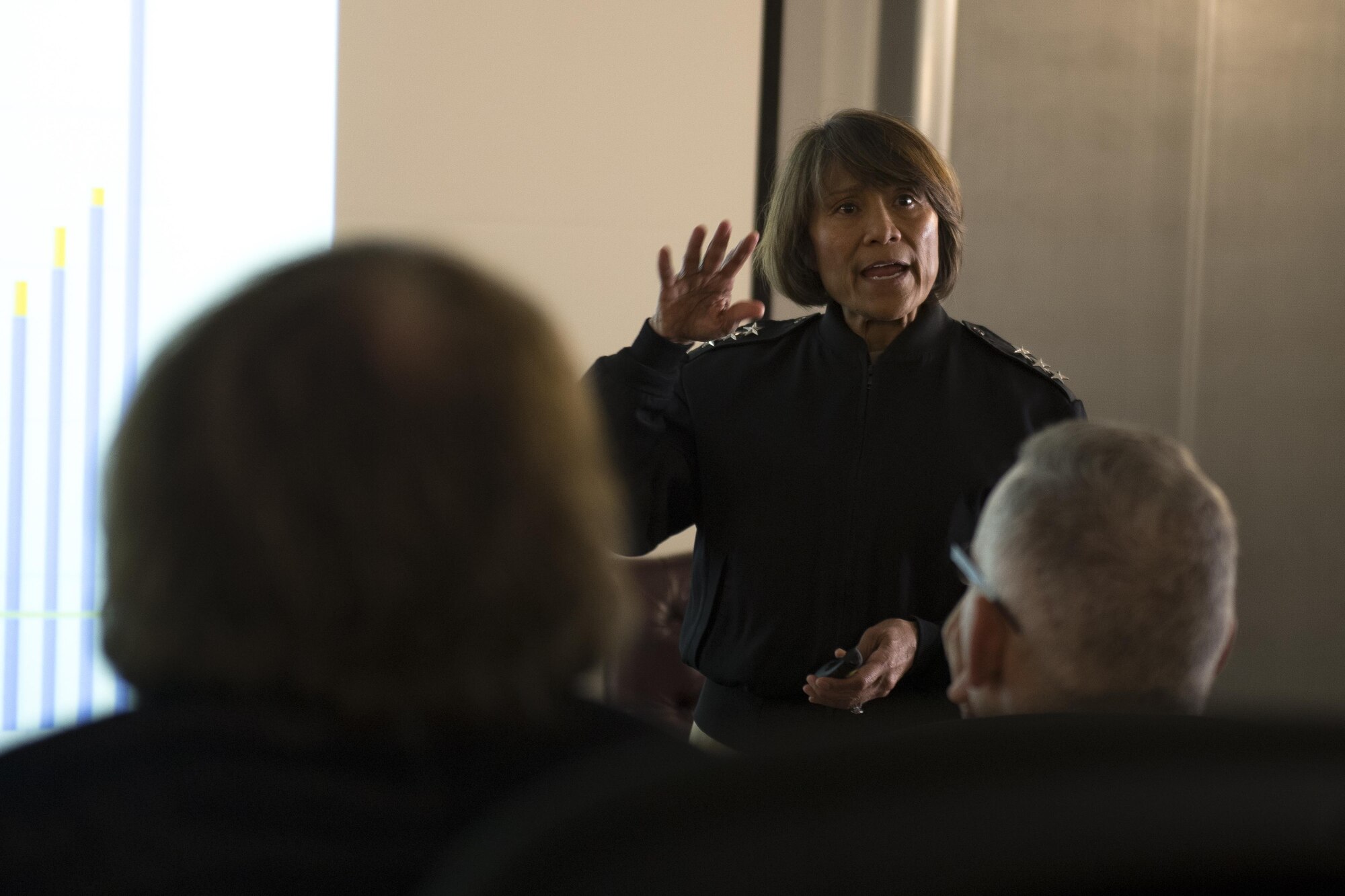 U.S. Navy Vice Adm. Raquel C. Bono, Defense Health Agency director, gives a presentation to base members during a visit to Ramstein Air Base, Germany, Aug. 22, 2017.