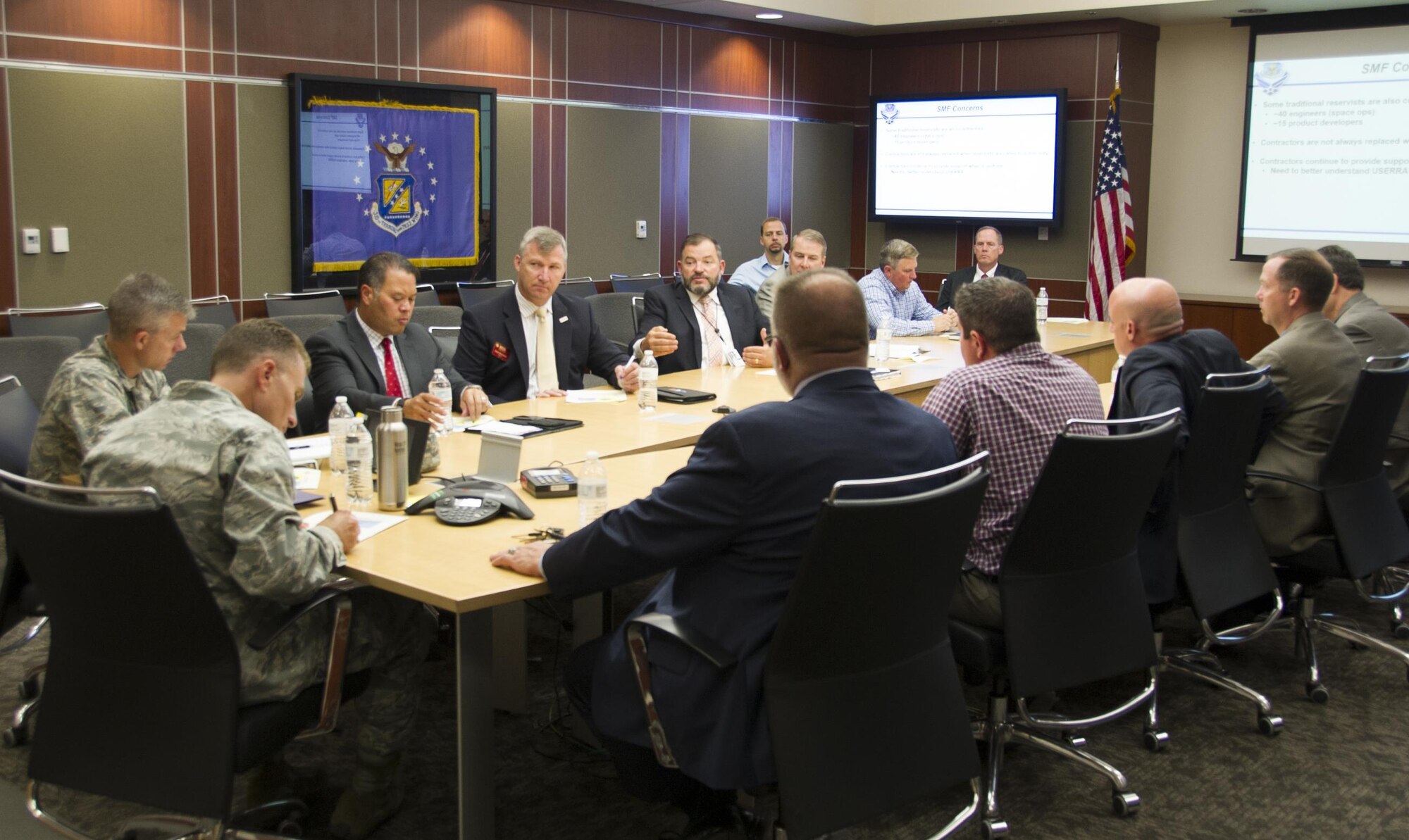 Col. Darren Buck, 310th Space Wing vice commander, takes notes while listening to feedback from local leaders during the 310th Space Wing’s Space Mission Force Industry Day at the wing headquarters building on Thursday