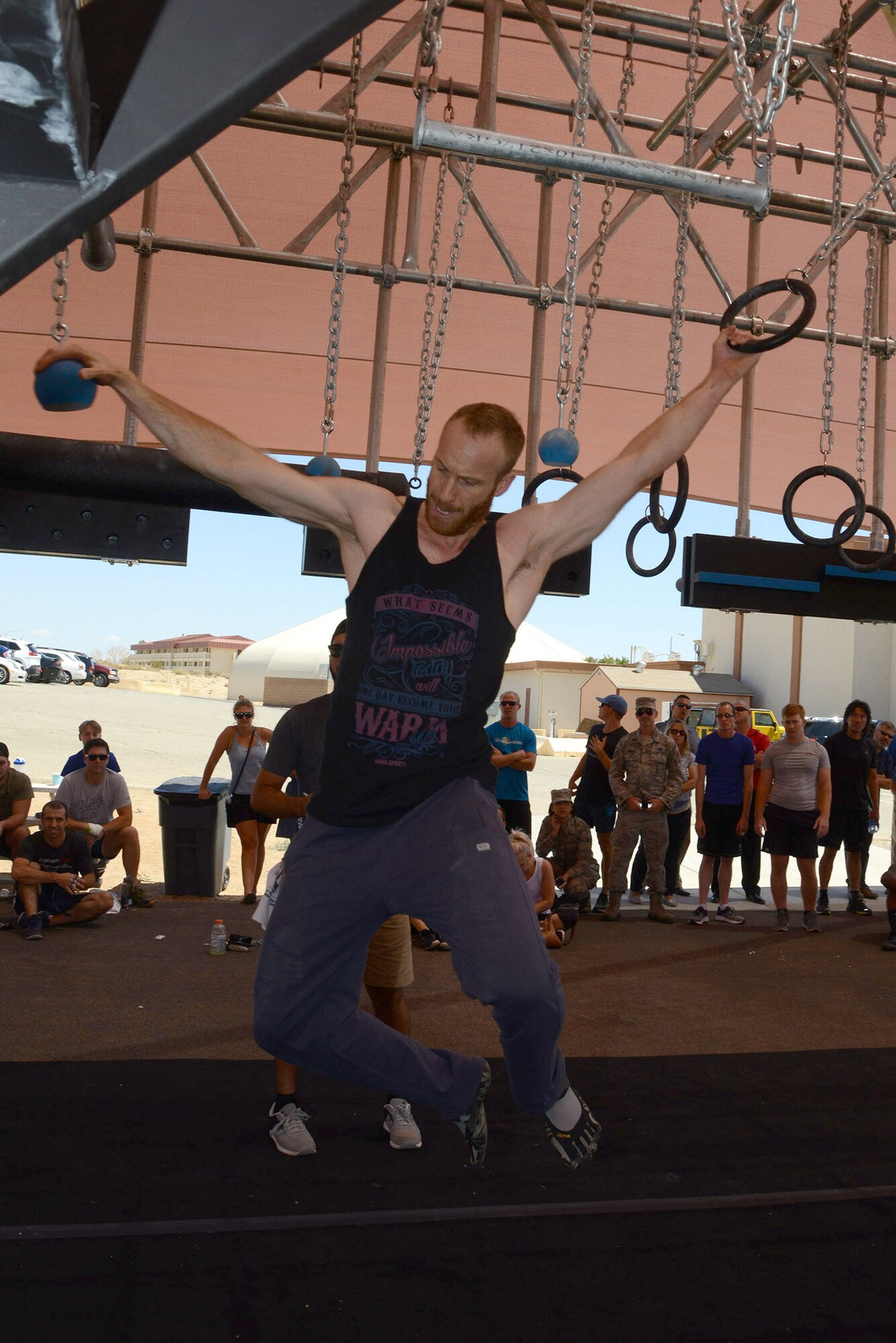 Krishtof Korda, 412th Test Engineering Group, powers his way through the Battle Rig during the timed competition. Korda was the first Team Edwards Member to complete the course. (U.S. Air Force photo by Christopher Ball)