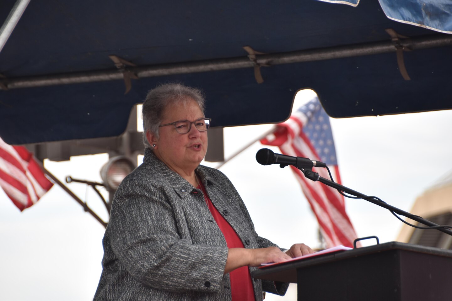 Maryland Port Administration Director of Harbor Development Chris Correale provides remarks about both the late Harold Catlett and the importance of the partnership between the MPA and the U.S. Army Corps of Engineers, Baltimore District in maintaining the channels associated with the Port of Baltimore at the dedication ceremony for Baltimore District’s new hydrographic survey vessel, Survey Vessel CATLETT Thursday morning August 24, 2017. Prior to her role with the MPA, Correale supervised Catlett, the vessel’s namesake, as the Operations Division chief for Baltimore District and noted that "he was known for his smile, graciousness and can-do attitude. He was an expert at his job and a tremendously-loyal team member. You don’t get much better than Harold Catlett.”