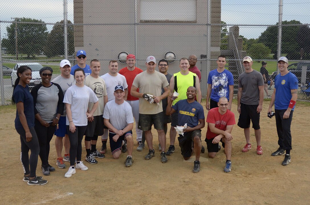 Airmen from the 445th Airlift Wing pose for a group photo after playing in the 10th Annual Sports Challenge August 5, 2017 at Dodger Field here. The competition, sponsored by the Air Force Sergeants Association Kittyhawk Chapter 751, featured an active duty team competing against a reserve team made up of Airmen from the wing. The active duty team won.  (U.S. Air Force photo/Staff Sgt. Joel McCullough)