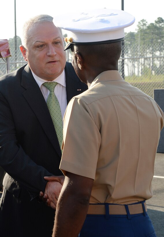 Officials cut ribbon, dedicate building to Marine Corps hero