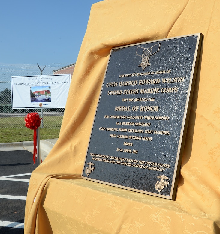 Officials cut ribbon, dedicate building to Marine Corps hero