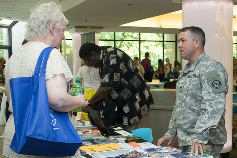 Service members, service providers and members of the military community take part in the "Building Collaborative Communities" event.