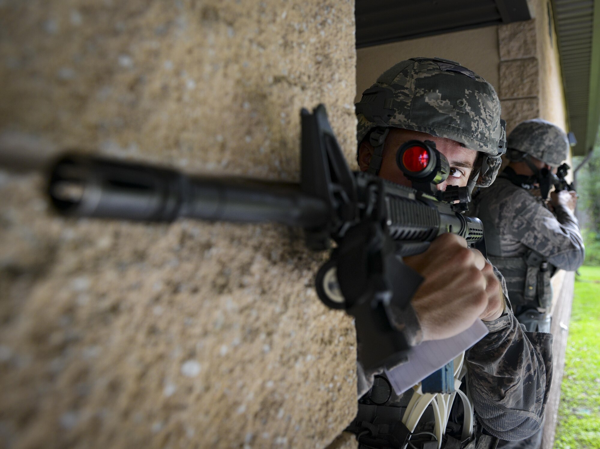 Staff Sgt. Brent Palmer, 23d Security Forces Squadron patrolman, guards an entry control during an emergency response exercise, Aug. 22, 2017, at Moody Air Force Base, Ga. The purpose of this active-shooter exercise was to inspect the recovery phase of an emergency situation while maintaining realism as members still responded as normal. (U.S. Air Force photo by Airman 1st Class Lauren M. Sprunk)