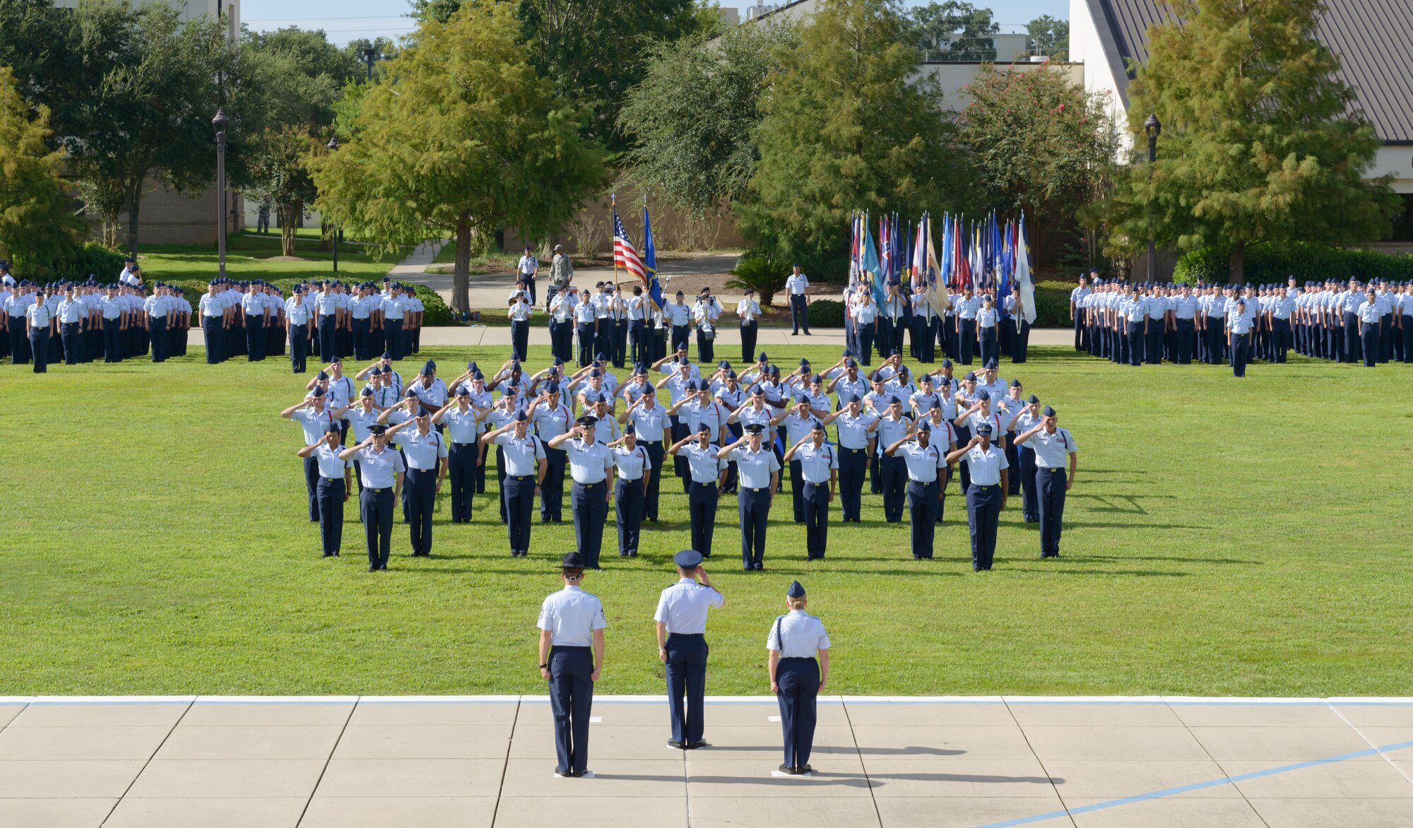 Parade group officers salute the commander of troops during the 2nd Air Force change of command ceremony at the Levitow Training Support Facility Aug. 23, 2017, on Keesler Air Force Base, Miss. Maj. Gen. Timothy Leahy took command of 2nd AF during the ceremony from Maj. Gen. Bob LaBrutta. (U.S. Air Force photo by André Askew)