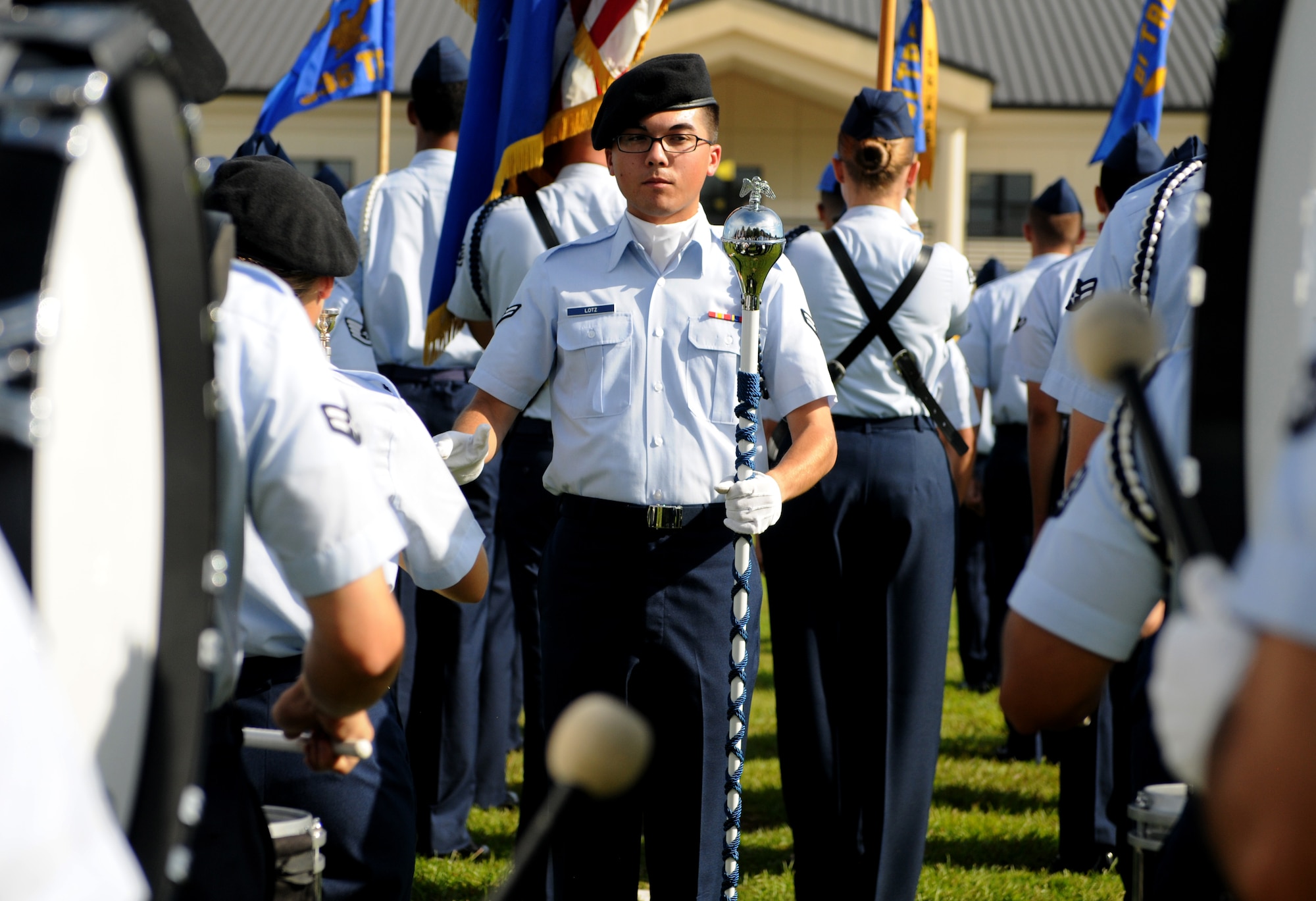 Airman 1st Class Nicholas Lotz, 338th Training Squadron student, leads the 81st Training Group Drum and Bugle Corps during the 2nd Air Force change of command ceremony at the Levitow Training Support Facility Aug. 23, 2017, on Keesler Air Force Base, Miss. Maj. Gen. Timothy Leahy took command of 2nd AF during the ceremony from Maj. Gen. Bob LaBrutta. (U.S. Air Force photo by Senior Airman Holly Mansfield)