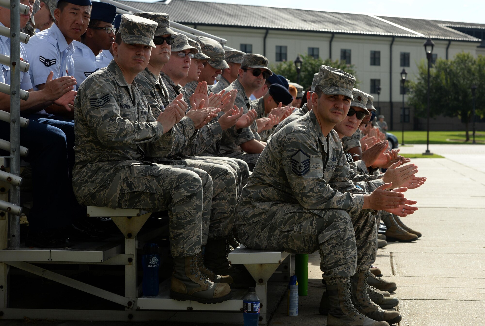 Keesler personnel applaud during the 2nd Air Force change of command ceremony at the Levitow Training Support Facility Aug. 23, 2017, on Keesler Air Force Base, Miss. Maj. Gen. Timothy Leahy took command of 2nd AF during the ceremony from Maj. Gen. Bob LaBrutta. (U.S. Air Force photo by Airman 1st Class Suzanna Plotnikov)