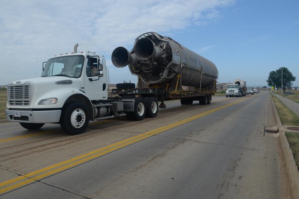 A convoy transports a Titan I missile from the flightline to the South Dakota Air and Space Museum, Aug. 16, 2017. After being stored in a hangar for more than 30 years, the missile is now a historic monument on display for visitors to view. (U.S. Air Force photo by Airman 1st Class Randahl J. Jenson)