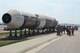 Visitors admire the nearly-finished Titan I Missile display at the South Dakota Air and Space Museum, Aug. 16, 2017. After $35,000 and two years of planning, the project is expected to be completed by the end of September, once the nose is placed on the missile. (U.S. Air Force photo by Airman 1st Class Randahl J. Jenson)