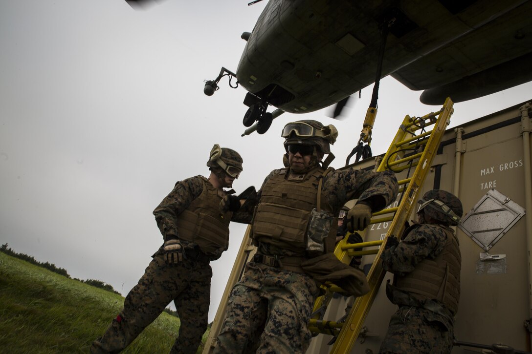 Sgt. Mitchell Castner, a landing support specialist, gets off a ladder during external lift training at Draughon Range near Misawa Air Base, Japan, August 21, 2017, in support of exercise Northern Viper 17. This combined-joint exercise is held to enhance regional cooperation between participating nations to collectively deter security threats. Castner, a native of Eatontown, New Jersey, is assigned to Combat Logistics Battalion 4, Combat Logistics Regiment 3, 3rd Marine Logistic Group. (U.S. Marine Corps photo by Lance Cpl. Andy Martinez)