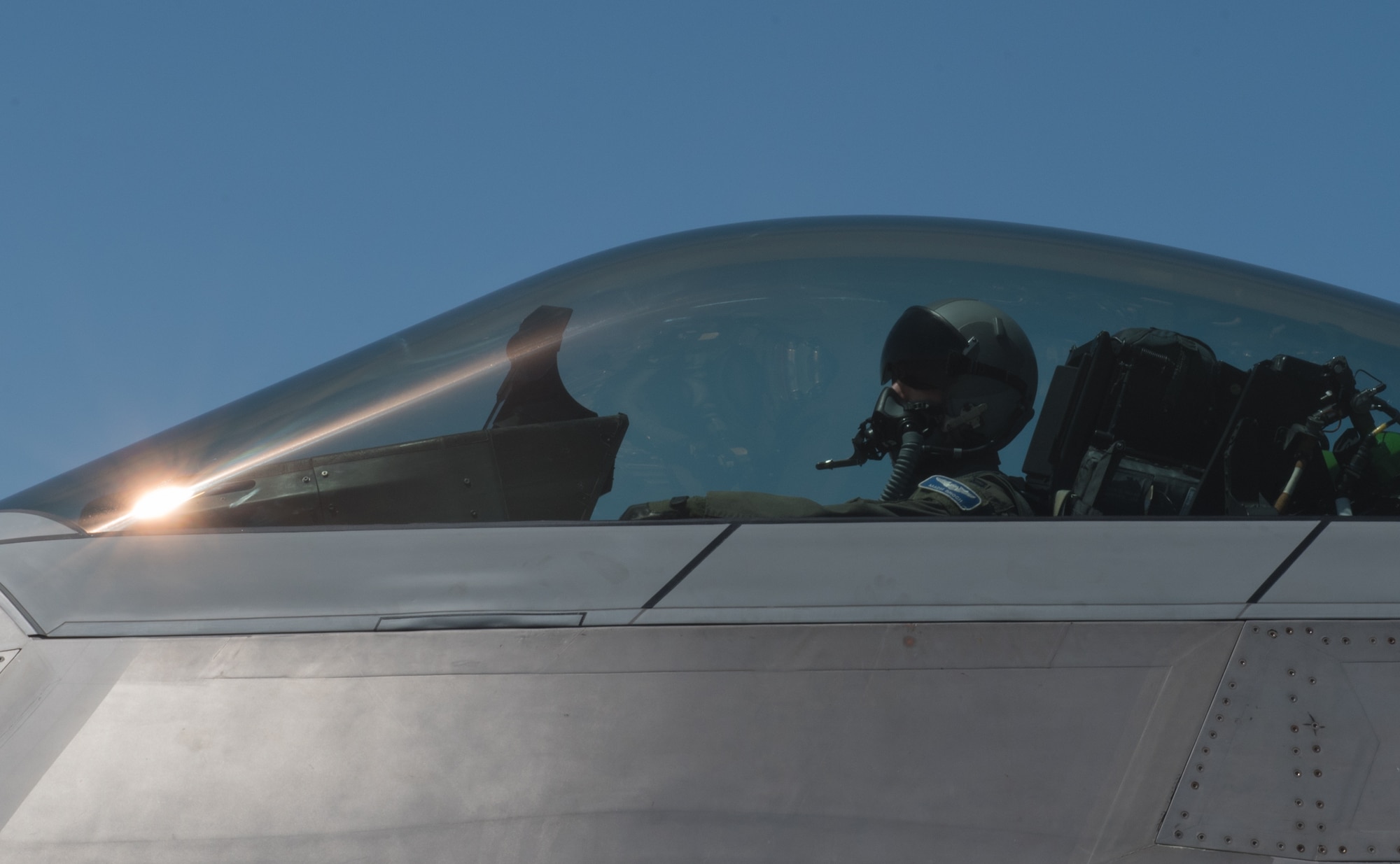 U.S. Air Force Capt. Mach, 94th Fighter Squadron F-22 Raptor pilot waits to taxi before his mission commander upgrade certification at Red Flag 17-4 at Nellis Air Force Base, Nev., Aug. 17, 2017. To acquire the mission commander certification, Mach is the lead for over 30 aircraft on this set mission for Red Flag. (U.S. Air Force photo by Staff Sgt. Carlin Leslie)