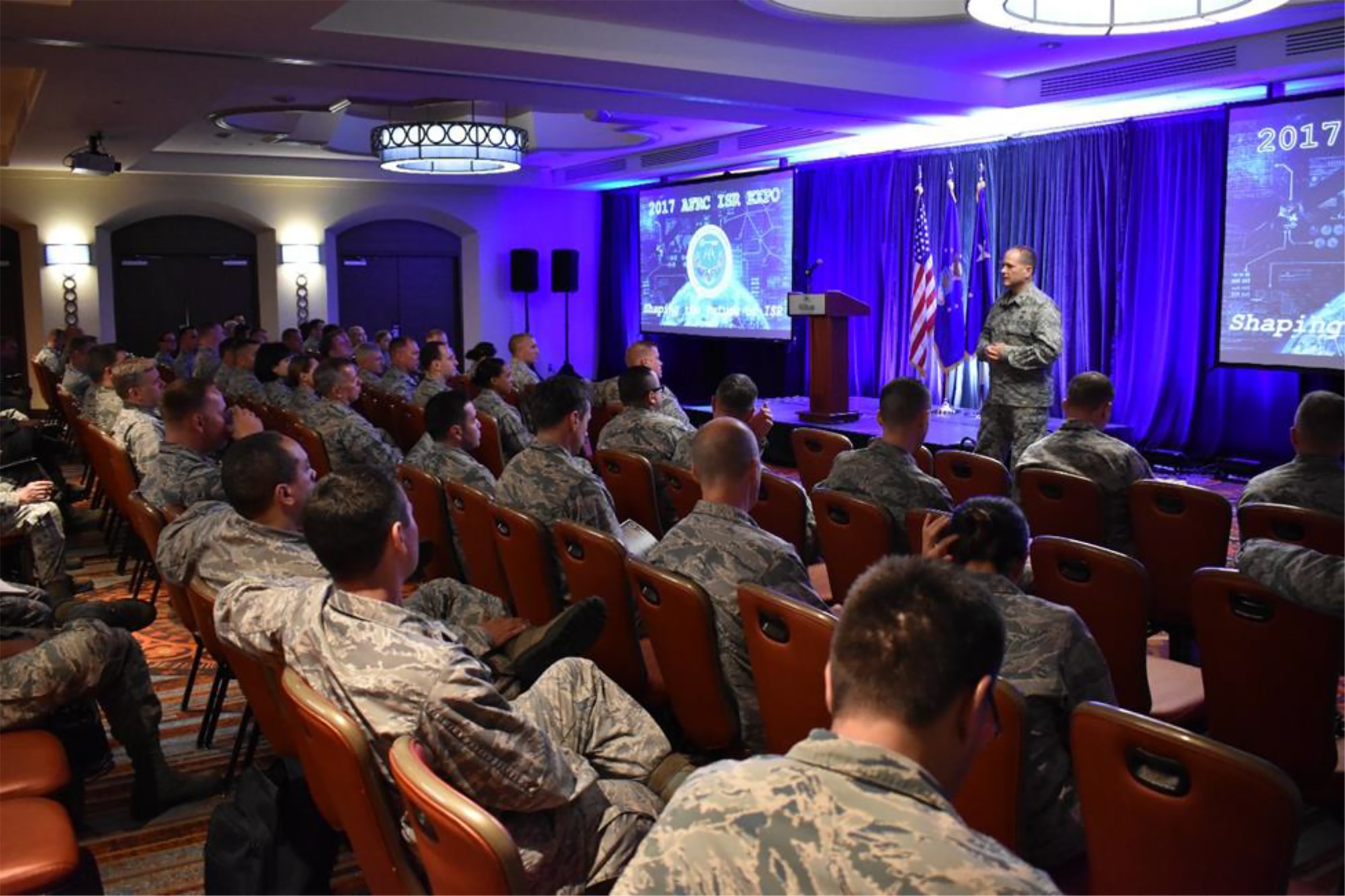 Col. Douglas A. Drakeley, Director of Intelligence, Headquarters AFRC, addresses the audience during an officer call at the 2017 AFRC ISR Expo