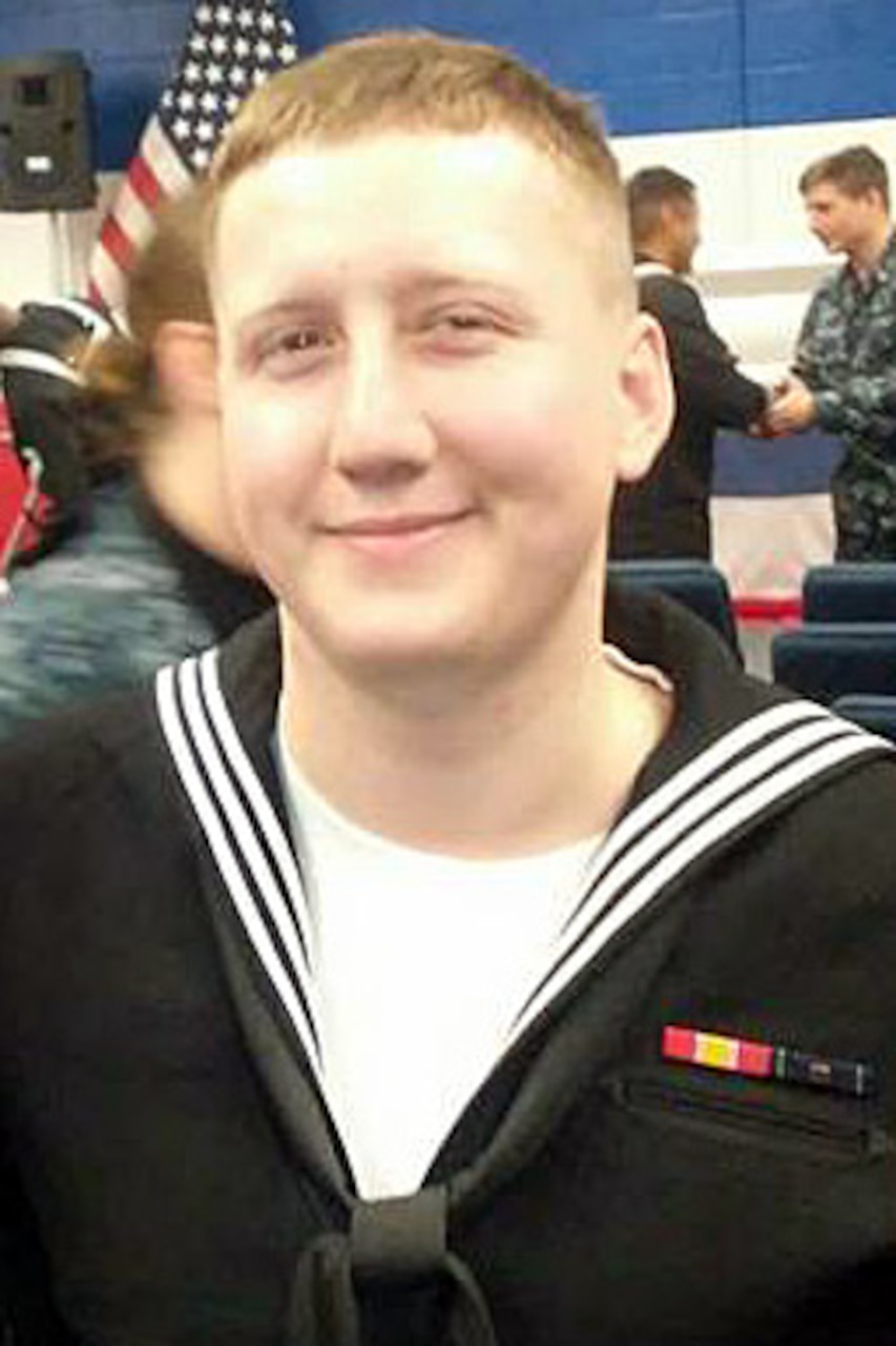 Interior Communications Electrician 3rd Class Logan Stephen Palmer, 23, from Decatur, Illinois
